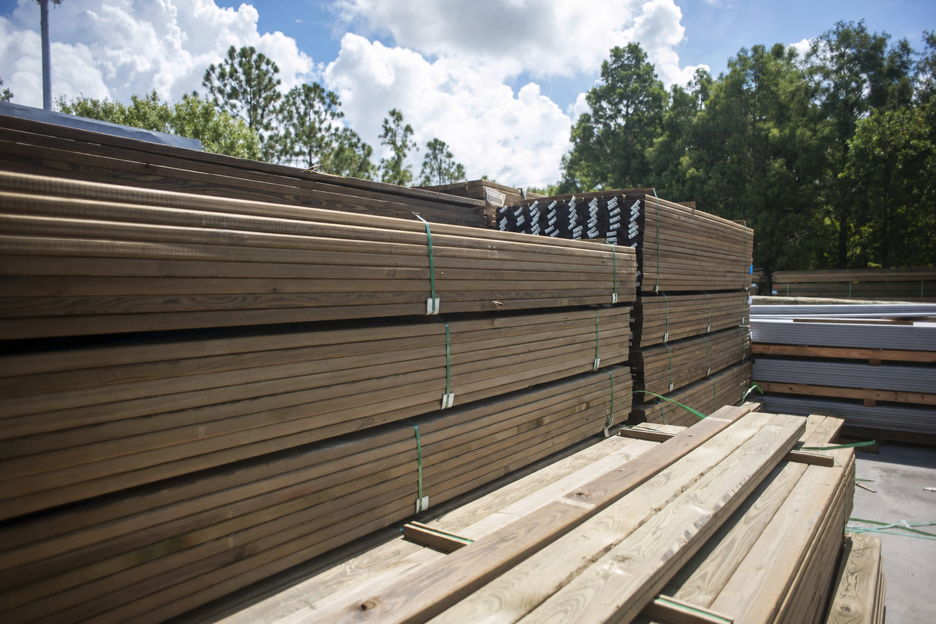Pressure-treated wood deck construction